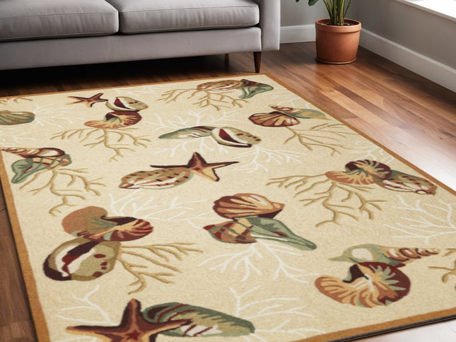 7' X 9' Beige Green And Brown Seashell and Coral Hand Tufted Area Rug