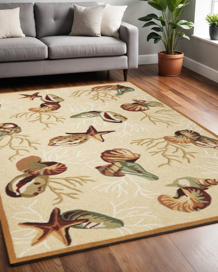 7' X 9' Beige Green And Brown Seashell and Coral Hand Tufted Area Rug