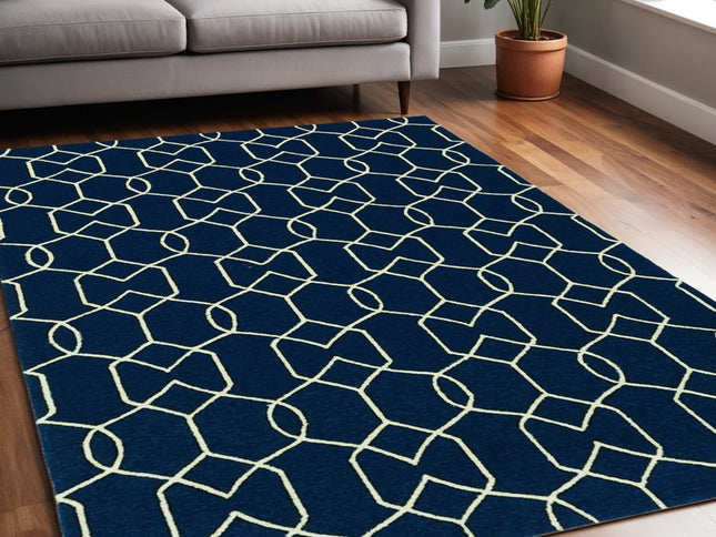 5' X 7' Navy Blue And Ivory Geometric Hand Hooked Area Rug