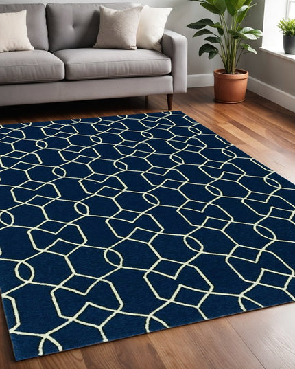 5' X 7' Navy Blue And Ivory Geometric Hand Hooked Area Rug