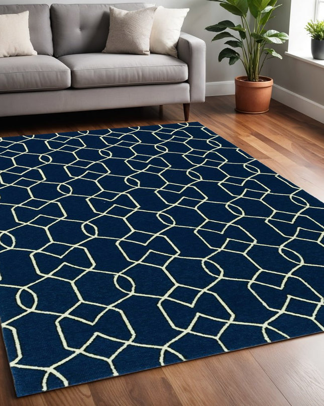 5' X 7' Navy Blue And Ivory Geometric Hand Hooked Area Rug