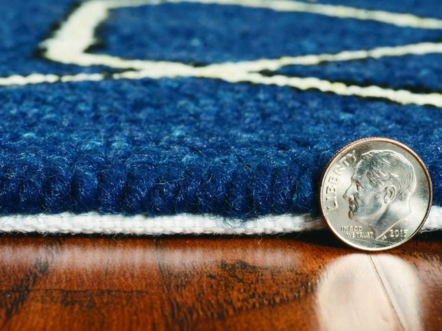 5' X 7' Navy Blue And Ivory Geometric Hand Hooked Area Rug