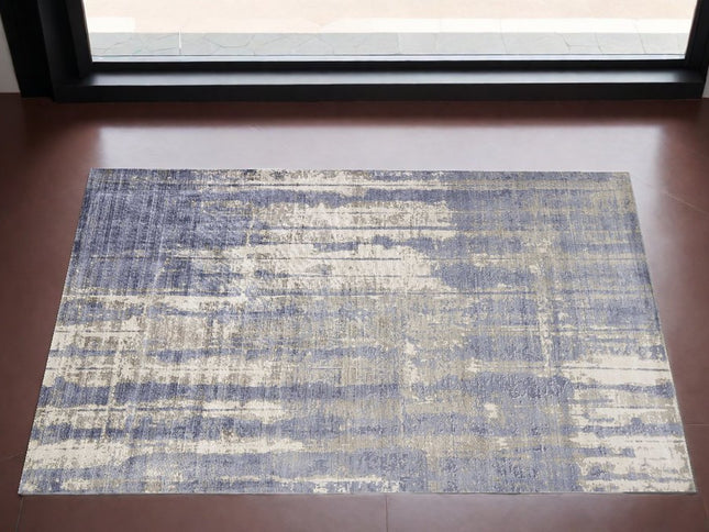 5' X 7' Gray And Ivory Abstract Hand Loomed Area Rug