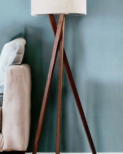 63" Brown And White Solid Wood Tripod Floor Lamp With White Linen Drum Shade