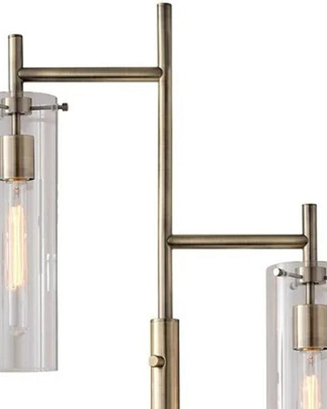 64" Brass Two Light Novelty Floor Lamp With Clear Glass Drum Shade