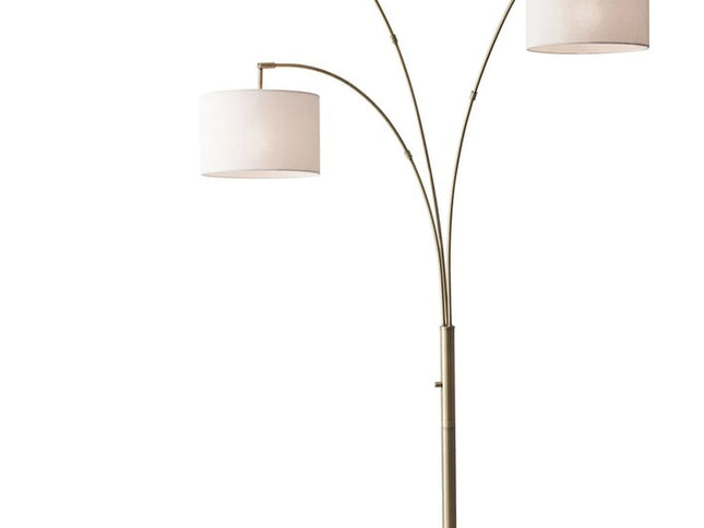 74" Brass Three Light Arc Floor Lamp With Off White Fabric Drum Shade
