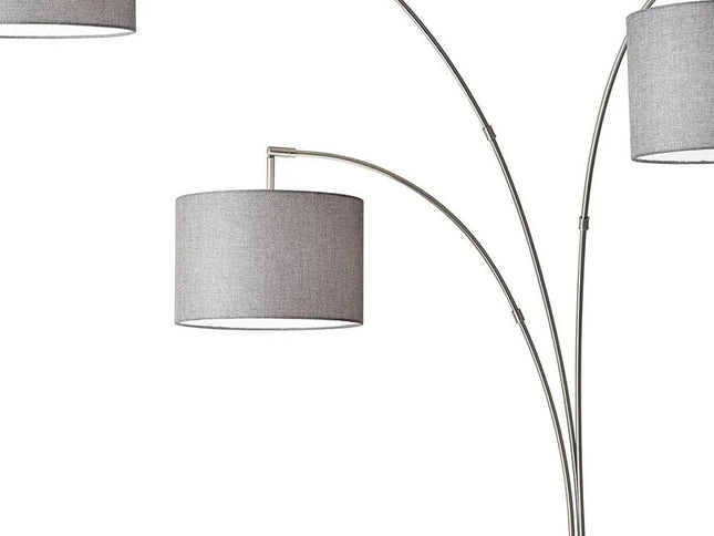 74" Brass Three Light Arc Floor Lamp With Off White Fabric Drum Shade