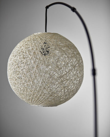 77" Antiqued Bronze Arched Floor Lamp With Groovy Beige Abstract Wicker Globe Shade