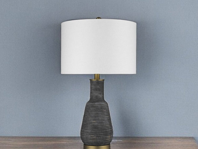 26" Distressed Black and Gold Ceramic Table Lamp With White Drum Shade