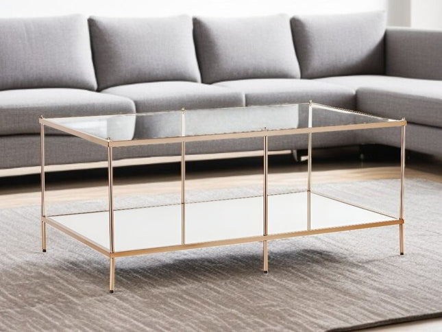 42" Clear And Gold Glass And Metal Coffee Table