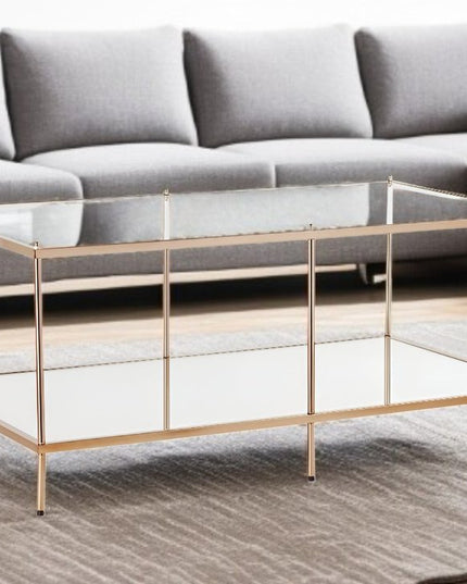 42" Clear And Gold Glass And Metal Coffee Table