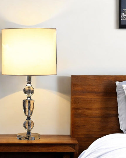 24" Clear And Silver Faux Crystal And Metal Table Lamp With White Drum Shade