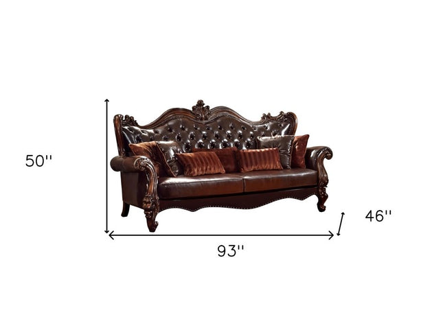 93" Brown Faux Leather Sofa And Toss Pillows With Burgundy Legs