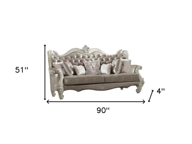 90" Gray Faux Leather Curved Sofa And Toss Pillows With Bone Legs