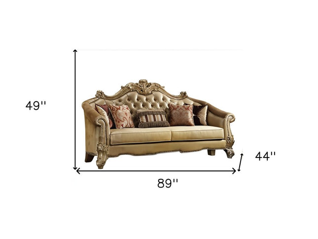 89" Bone Faux Leather Sofa And Toss Pillows With Gold Legs