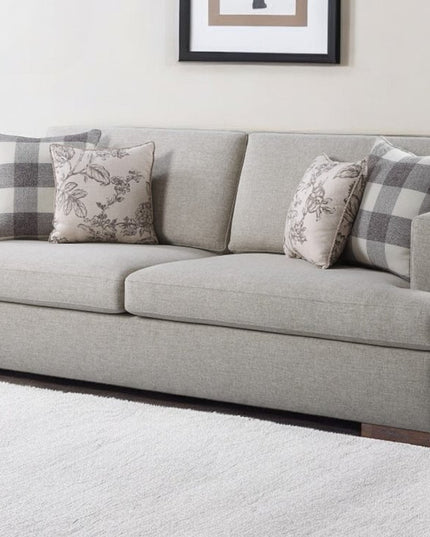 92" Beige Fabric Sofa And Toss Pillows With Brown Legs