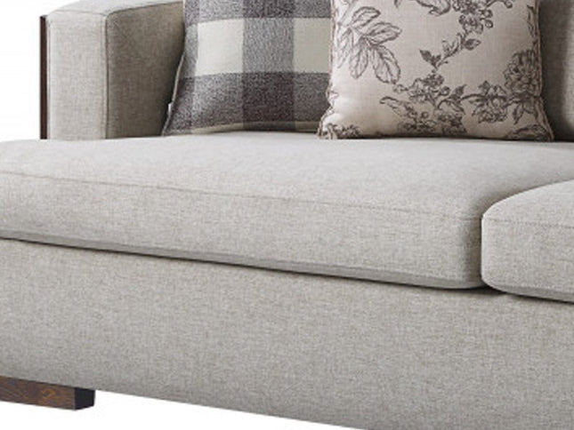 92" Beige Fabric Sofa And Toss Pillows With Brown Legs