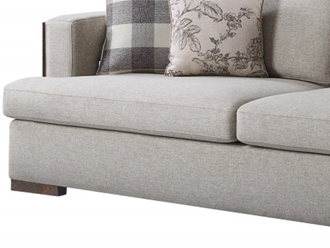 92" Beige Fabric Sofa And Toss Pillows With Brown Legs