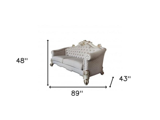 89" Ivory Velvet Sofa And Toss Pillows With Pearl Legs