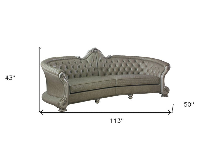 113" Bone Faux Leather Sofa And Toss Pillows With White Legs