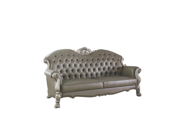 96" Bone Faux Leather Sofa And Toss Pillows With White Legs