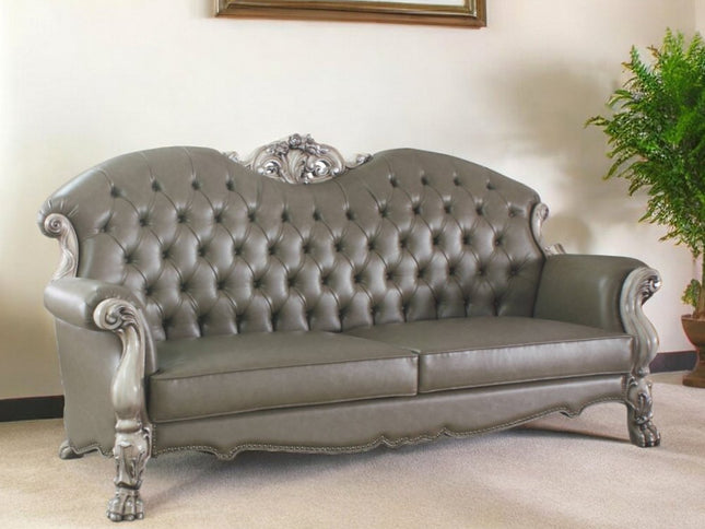 96" Bone Faux Leather Sofa And Toss Pillows With White Legs