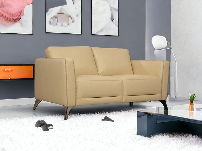 59" Cream And Silver Leather Loveseat