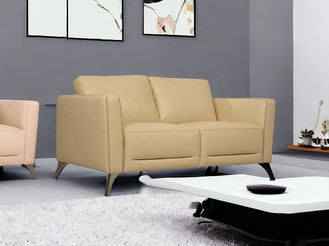 59" Cream And Silver Leather Loveseat