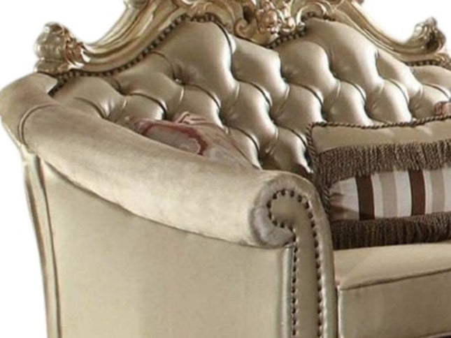 67" Bone And Gold Faux Leather Loveseat and Toss Pillows