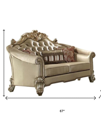 67" Bone And Gold Faux Leather Loveseat and Toss Pillows