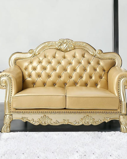 64" Bone And Gold Faux Leather Loveseat and Toss Pillows