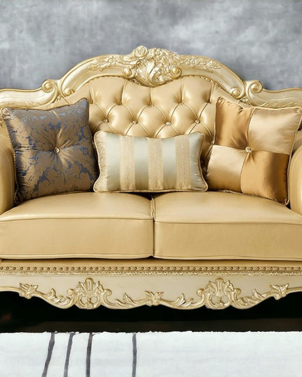 64" Bone And Gold Faux Leather Loveseat and Toss Pillows