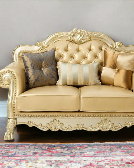 64" Bone And Gold Faux Leather Loveseat and Toss Pillows