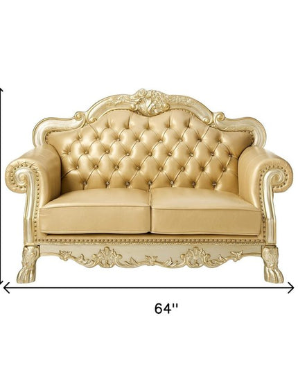 64" Bone And Gold Faux Leather Loveseat and Toss Pillows