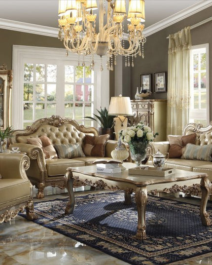 64" Bone And Gold Faux Leather Loveseat and Toss Pillows