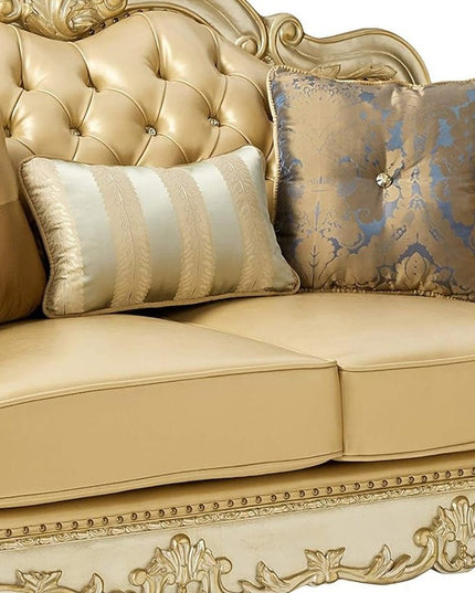 64" Bone And Gold Faux Leather Loveseat and Toss Pillows