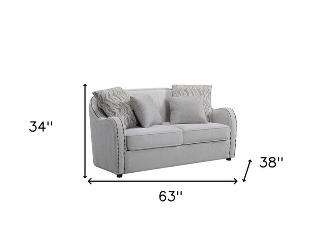 63" Beige And Black Linen Curved Loveseat and Toss Pillows