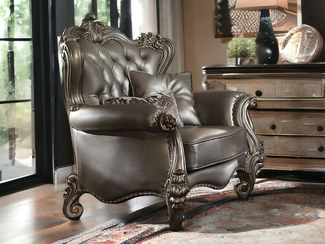 44" Silver and Platinum Faux Leather Tufted Wingback Chair And Toss Pillows