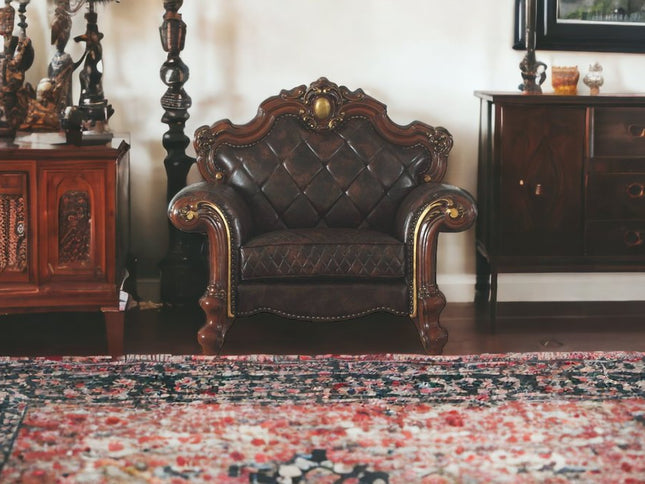 50" Chocolate Faux Leather Tufted Chesterfield Chair And Toss Pillow