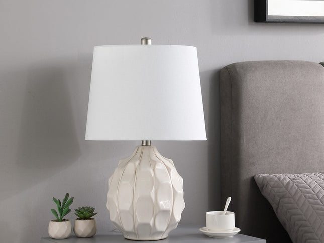 22" Cream Ceramic Faceted Table Lamp With Off White Drum Shade