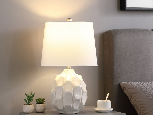 22" Cream Ceramic Faceted Table Lamp With Off White Drum Shade