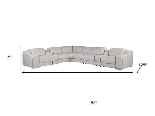 Light Gray Italian Leather Power Reclining Curved Eight Piece Corner Sectional With Console