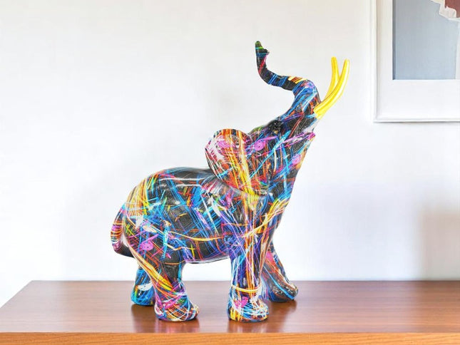 7" Blue Yellow And Pink Resin Elephant Tabletop Sculpture
