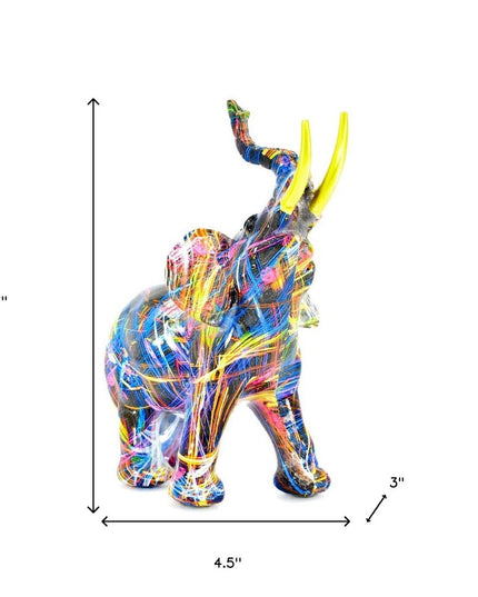 7" Blue Yellow And Pink Resin Elephant Tabletop Sculpture
