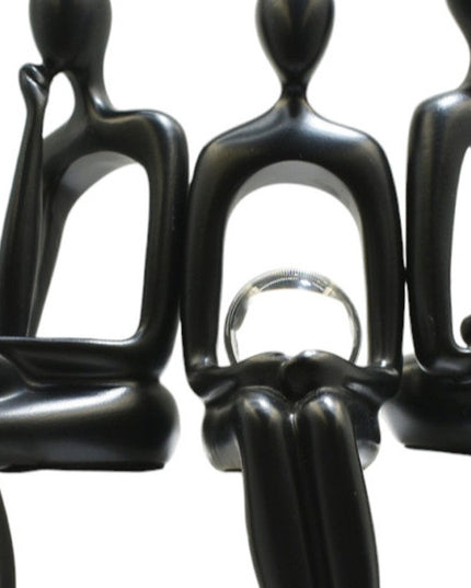 Set of Three Black Resin People Tabletop Sculpture