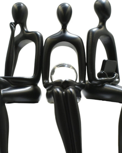 Set of Three Black Resin People Tabletop Sculpture