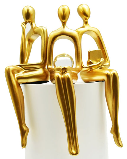 Set of Three Gold Resin People Tabletop Sculpture