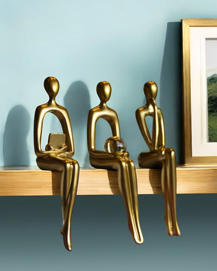 Set of Three Gold Resin People Tabletop Sculpture