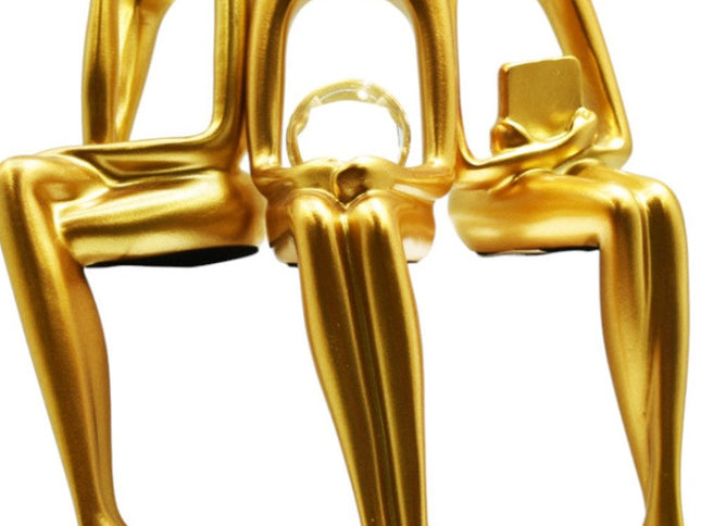 Set of Three Gold Resin People Tabletop Sculpture