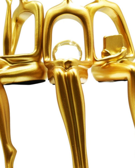 Set of Three Gold Resin People Tabletop Sculpture